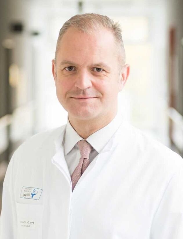 Arzt Rheumatologe Klaus